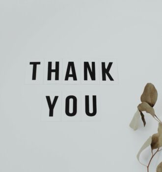 A minimalist thank you note with eucalyptus leaves, perfect for expressing gratitude.